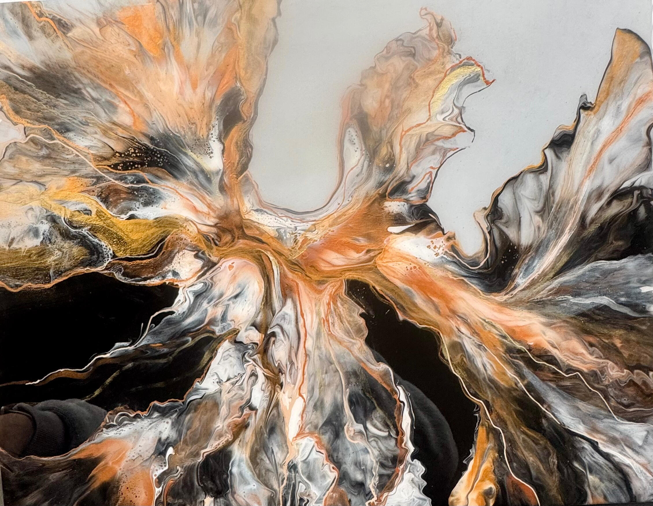 “Phoenix”- The fluid techniques used in this acrylic pour painting evoke a sense of motion and energy, as if the phoenix is soaring into the sky. The organic shapes and flowing lines draw viewers in, inviting them to imagine the ascent of this my creature.
